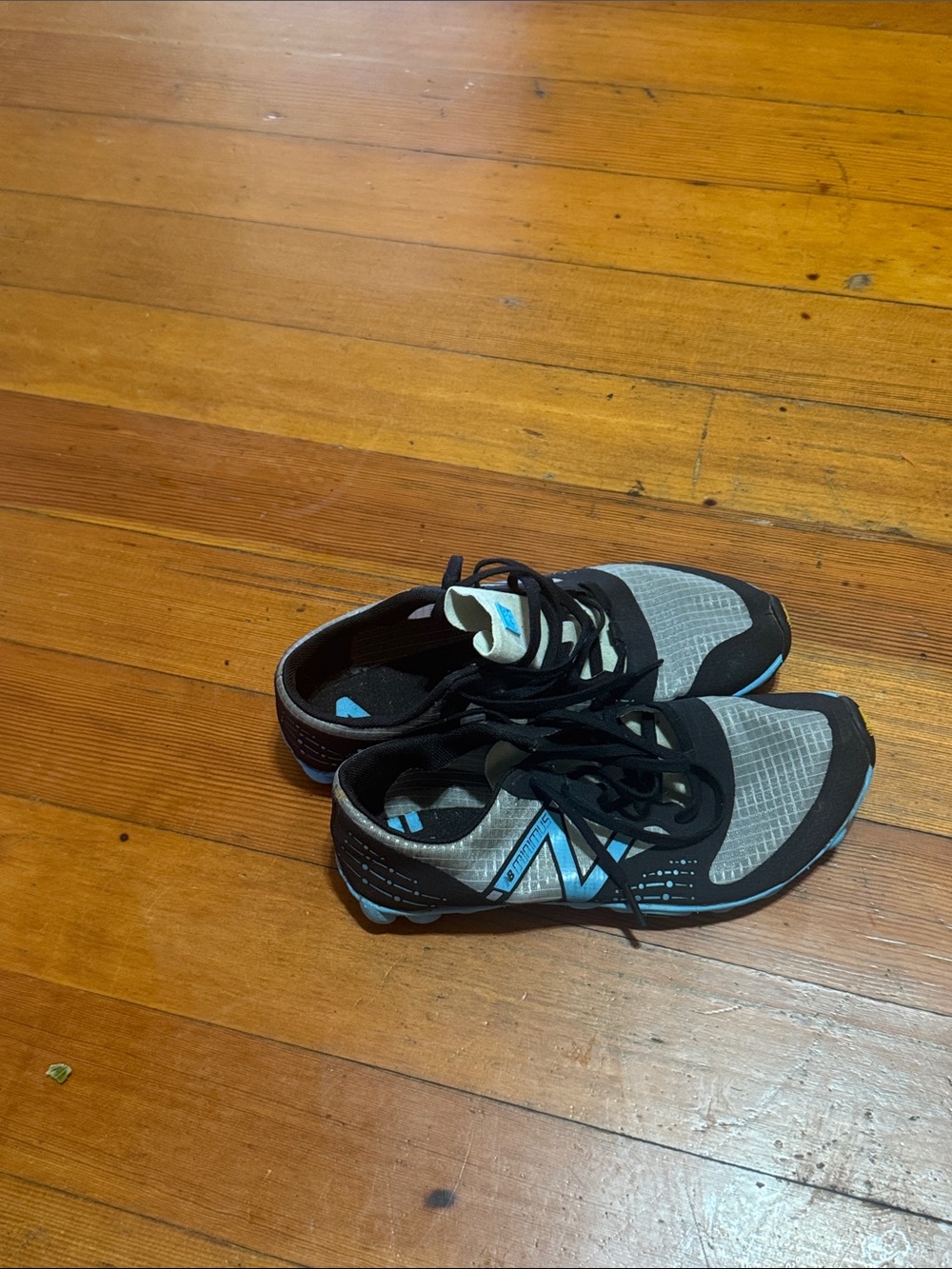 New Balance Gray and Black Athletic Sneakers with Blue Accents